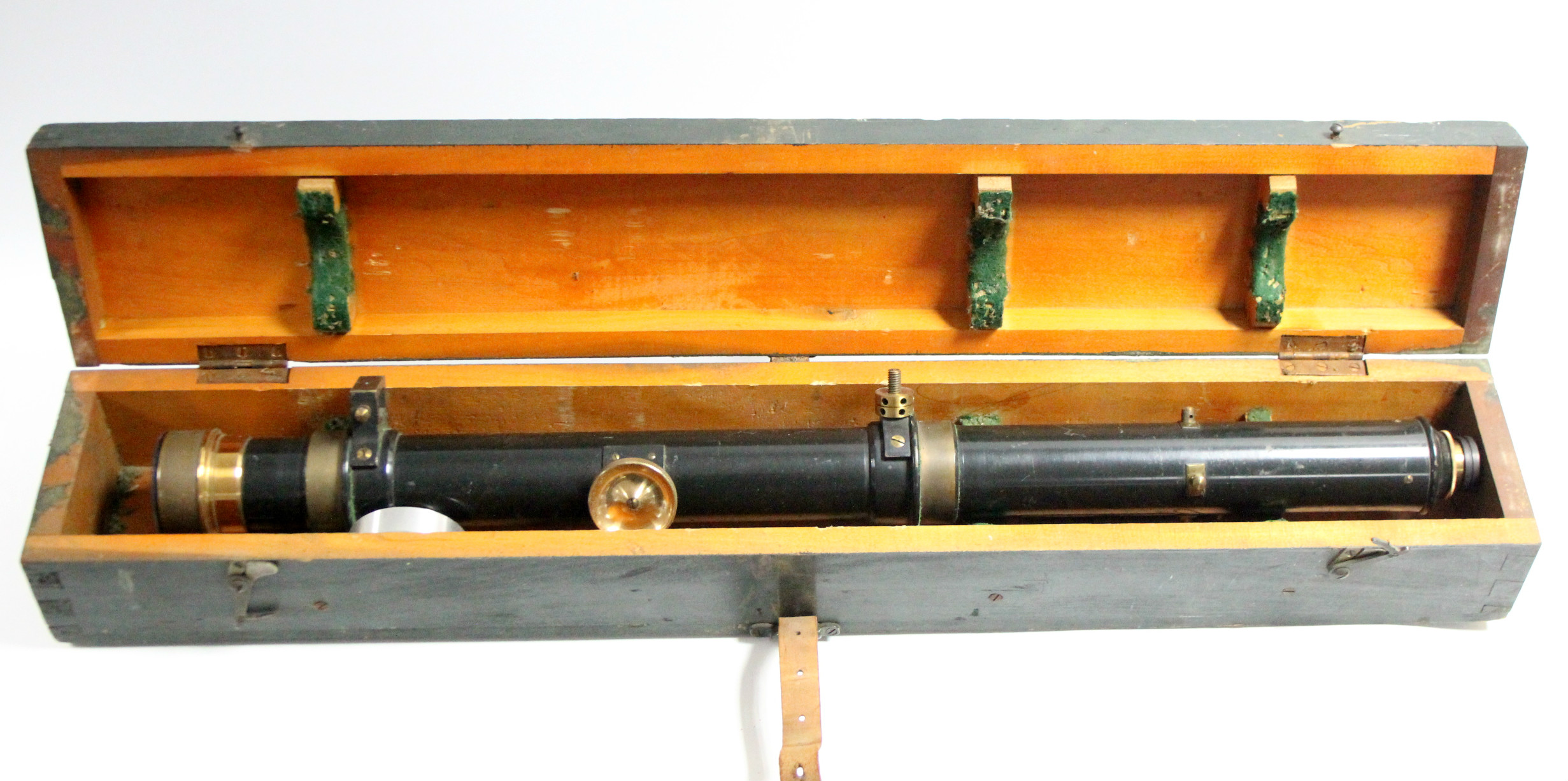 A WWII black lacquered sighting telescoping with brass fittings, 29½” long, in fitted case.