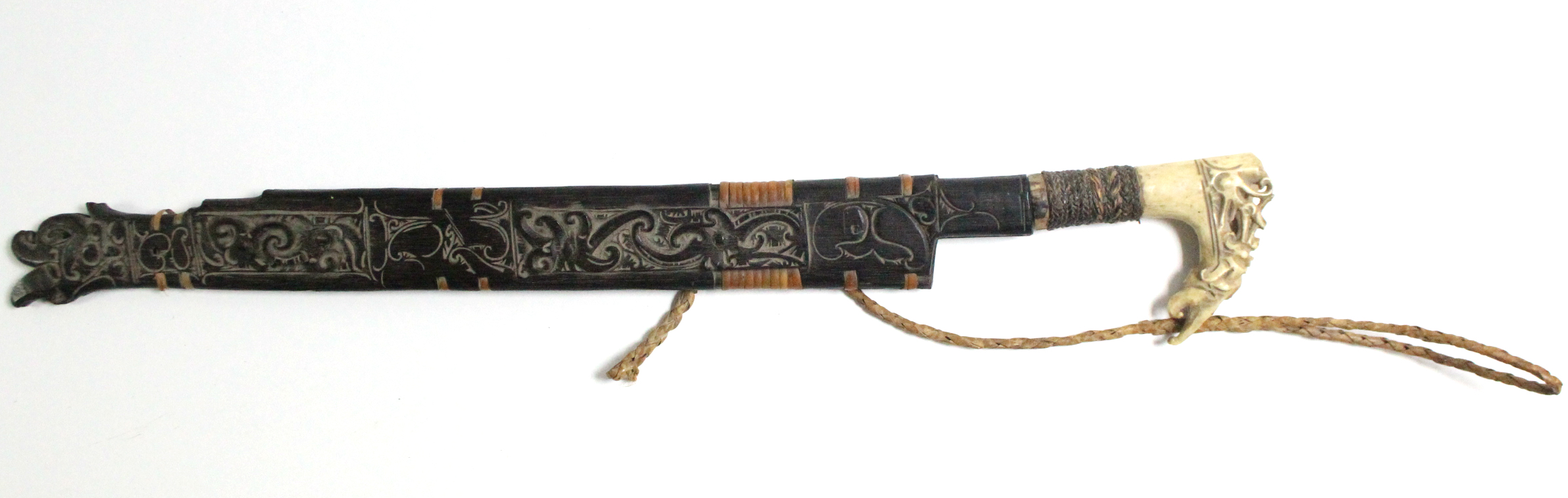 A Borneon ceremonial knife with 18½” long single-edge curved blade, with carved bone handle, & - Image 5 of 5