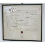 Two antique indentures on vellum, each in glazed frame.