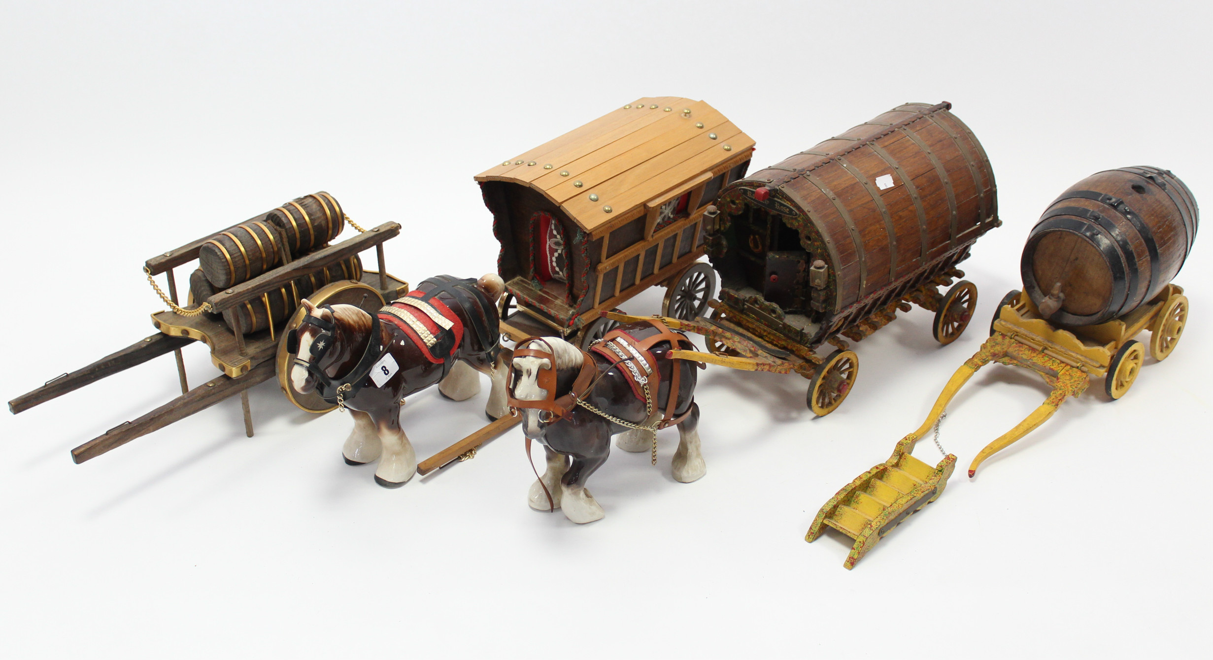 Two Shire horse ornaments; & four horse cart ornaments; three large wooden model carts (various