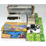 A Commodore “Vic-20” colour computer complete starter pack, boxed; & various boxed games & toys.