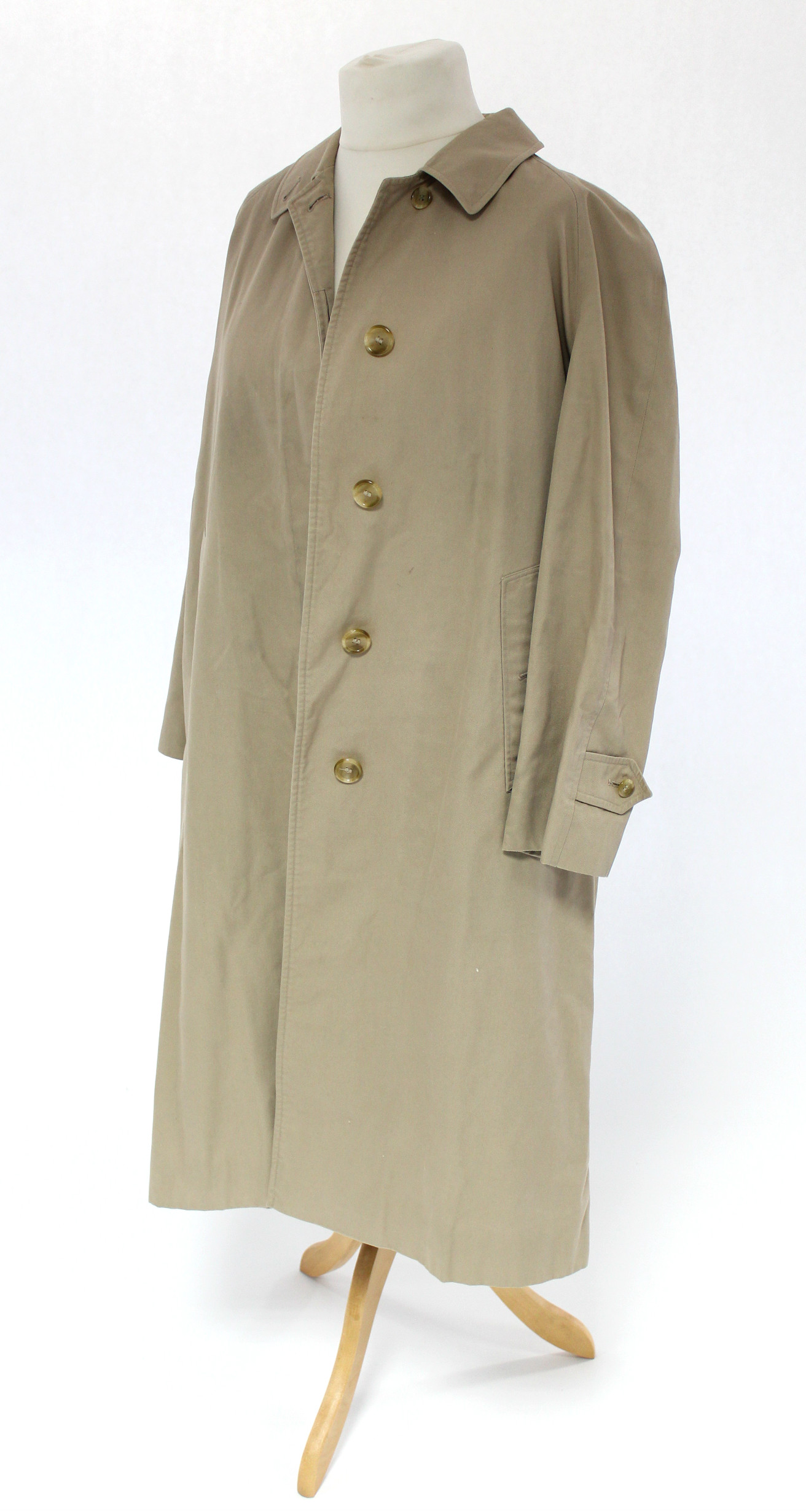 A Burberry ladies’ fawn Macintosh; a Harrods linen coat; a Streliz green tweed skirt & jacket; & a