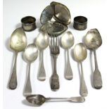 A Sterling silver engraved compact; two silver napkin rings; seven various silver spoons; & a silver