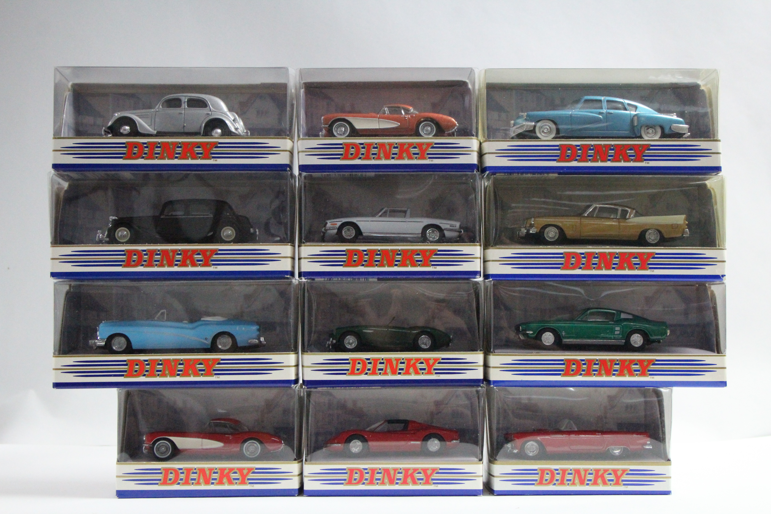 Twelve Matchbox dinky die-cast scale models, each with window box.