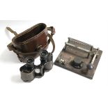 A pair of WWI British binocular prismatic field glasses with leather case; & a British Morse Code