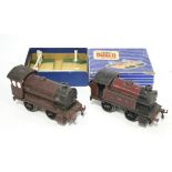 Two Hornby clockwork-operated tinplate “O” gauge model 0-4-0 tank locomotives unboxed; & a Hornby