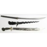 A Malaysian Kris with 14½” long shaped blade & with carved treen sheath; a Philippine sword; & a