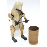 AN ANTIQUE FUR-COVERED AUTOMATON DRUMMER BEAR, complete with drum, 33” tall, w.a.f.