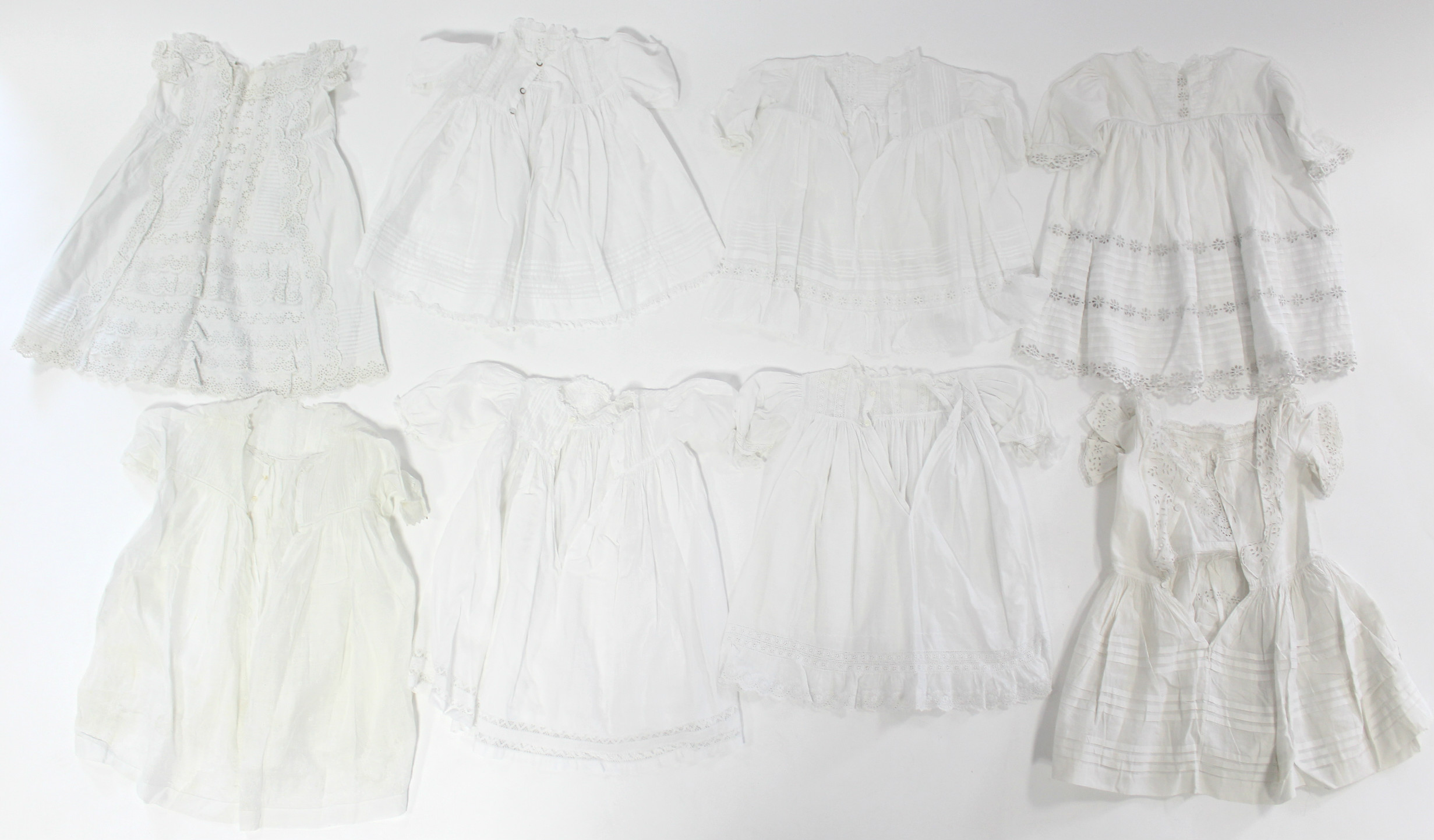 Twelve various early 20th century babies’ embroidered white cotton short gowns; - Image 3 of 3