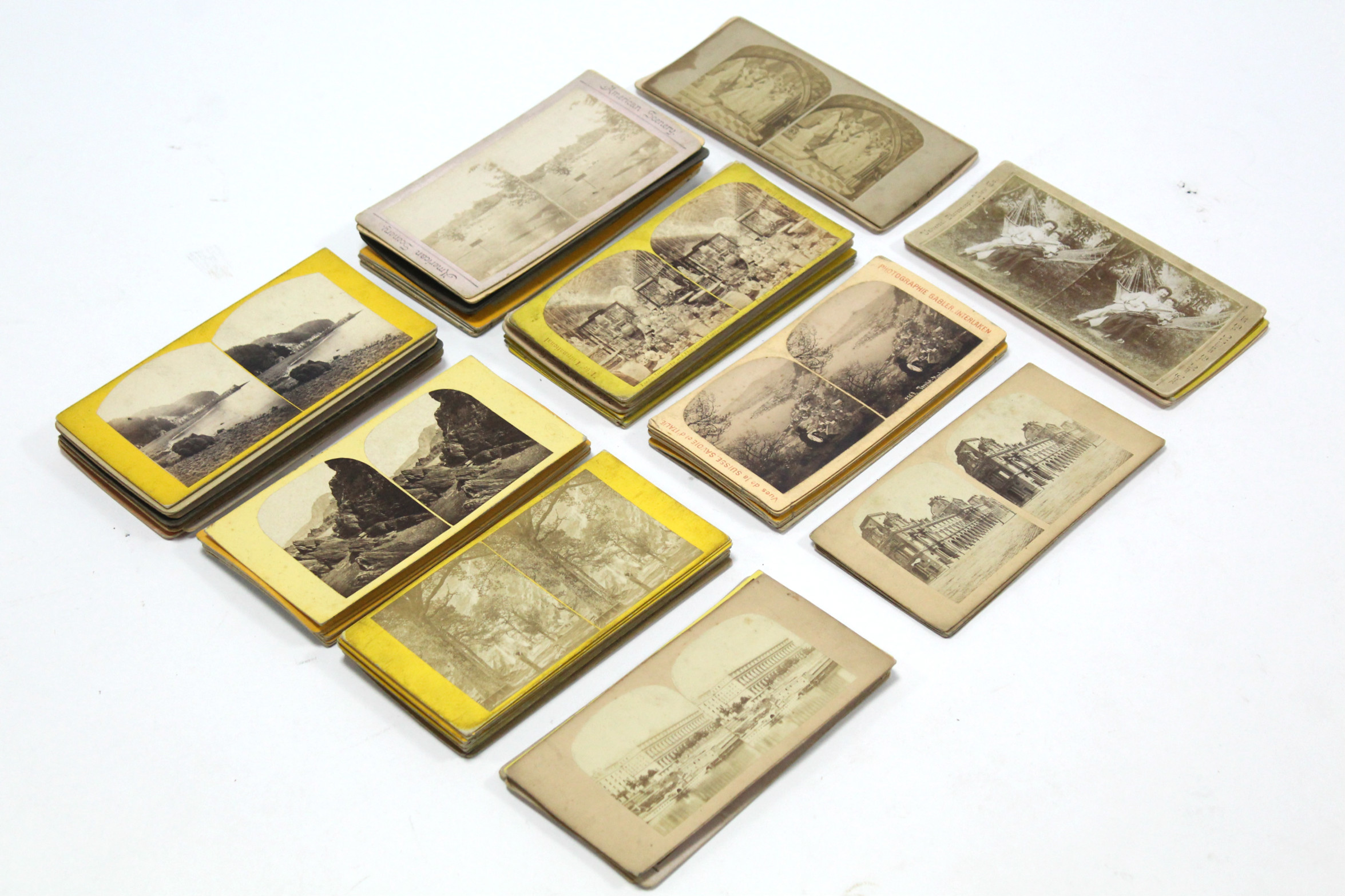 Seventy-four various stereograph cards.