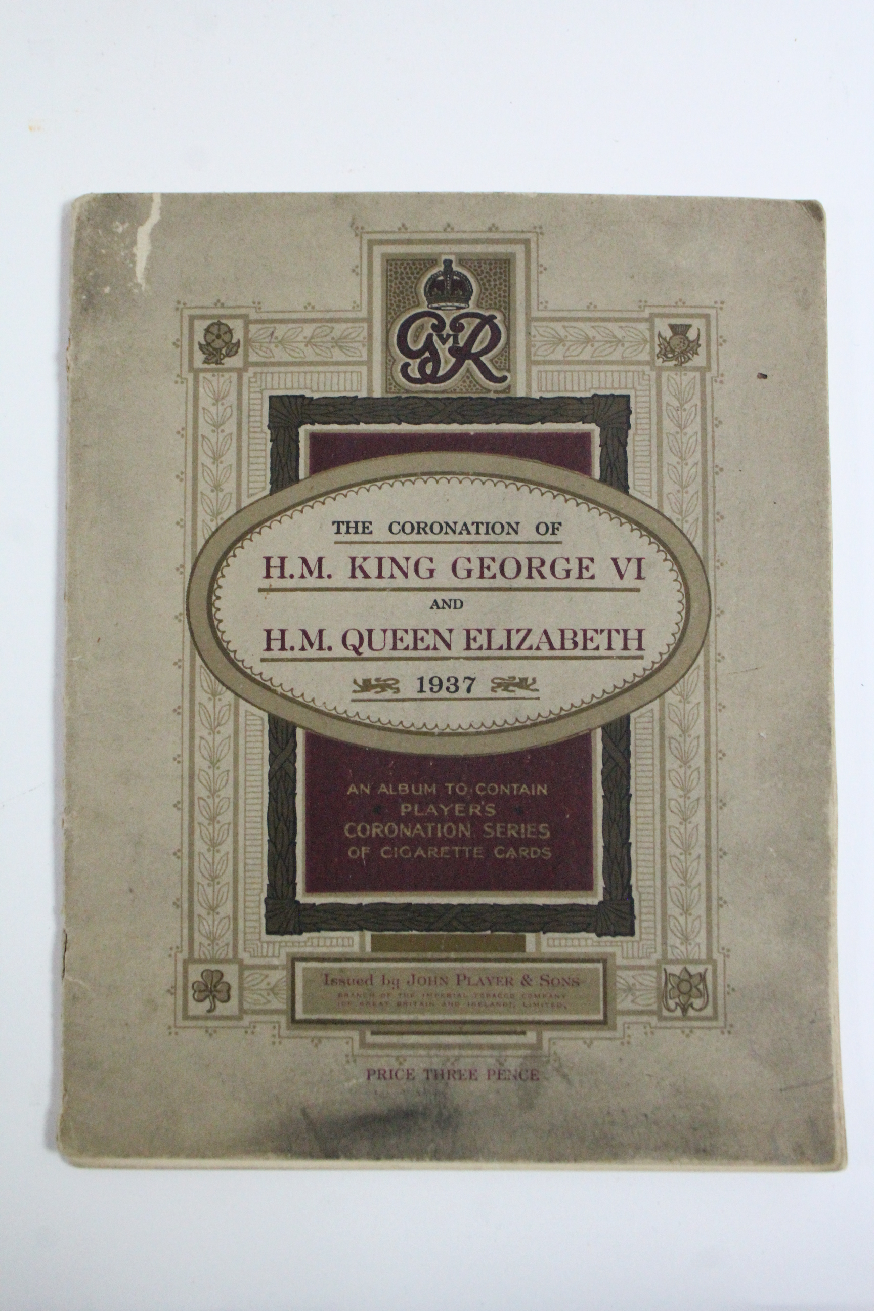 A John Player cigarette picture card album “The Coronation of H.M. King George VI and H.M. Queen