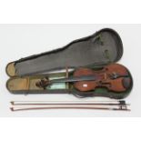 A 19th century violin, 23” long (w.a.f.), with two bows, & with case.