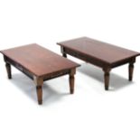 A pair of mahogany finish rectangular low coffee tables, each with moulded frieze, & on turned