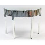 A Brissi demi-lune bevelled mirrored hall table on four square tapered legs, 42” wide.