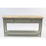 A pale green painted & natural wood side table, fitted three frieze drawers & on square tapered legs