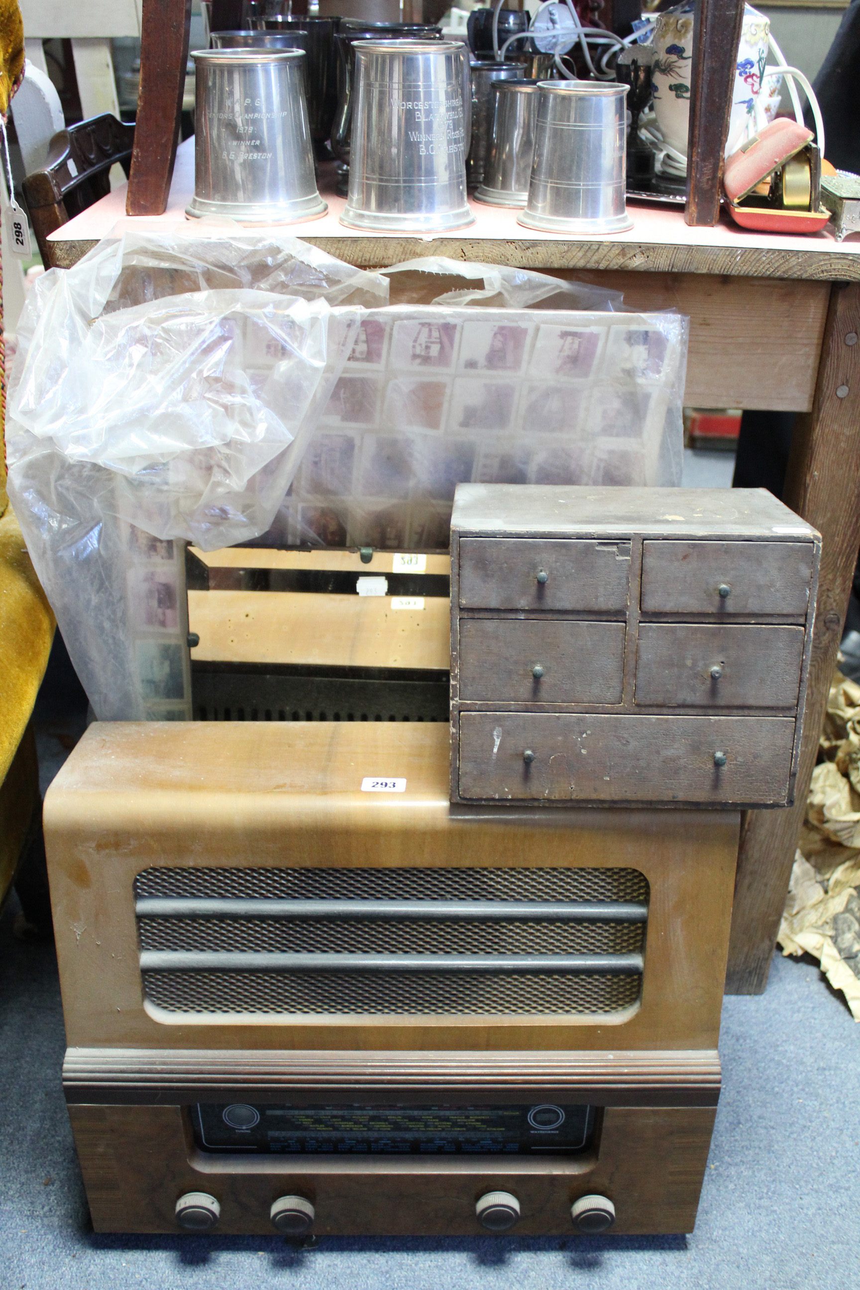 An Etronic valve radio (Model No. ETA 632) in walnut-finish case; together with a pair of brass