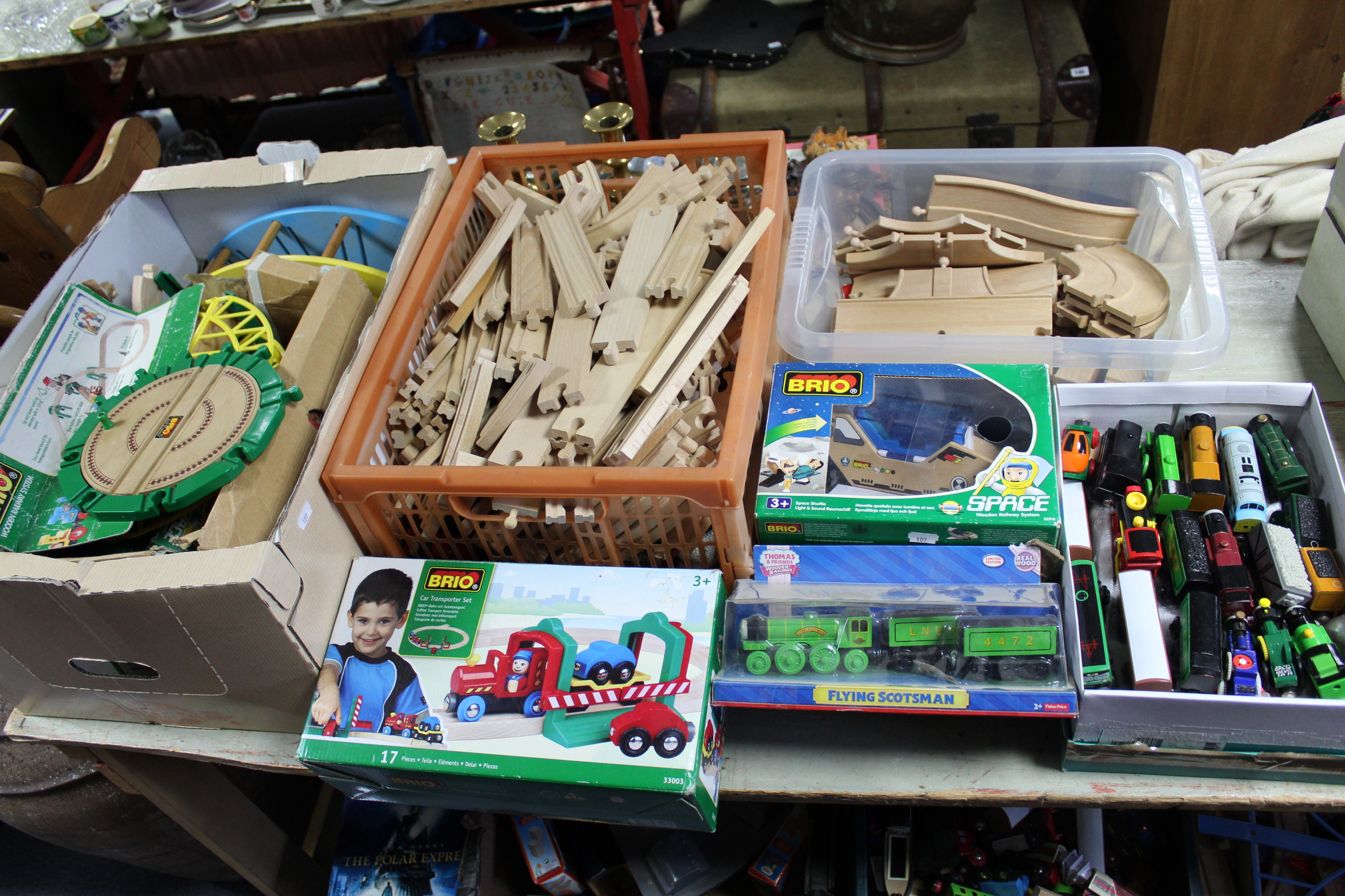 A large quantity of Brio wooden child’s train set items; & various Fisher Price “Thomas The Tank