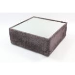 A large square box ottoman occasional table upholstered leopard print material, & with mirrored top,