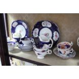 A Victorian china floral decorated twenty-nine piece matched tea service; & a Royal Stafford china