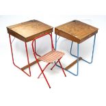 Two Tri-ang tubular-metal & wooden child’s desks; & a tubular-metal folding child’s chair.