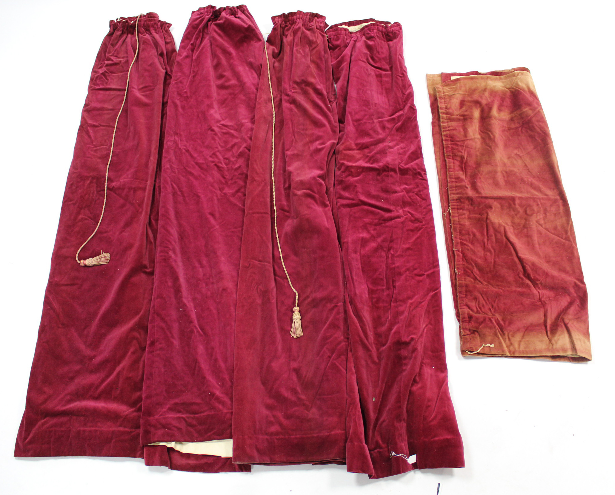 Two pairs of crimson velour curtains; a tapestry frame; various household textiles; & various