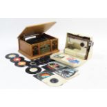 A retro-style cd/record player; & a Frister & Rossmann electric sewing machine, with case.