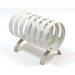 A white finish cylindrical magazine rack, 17½” wide.