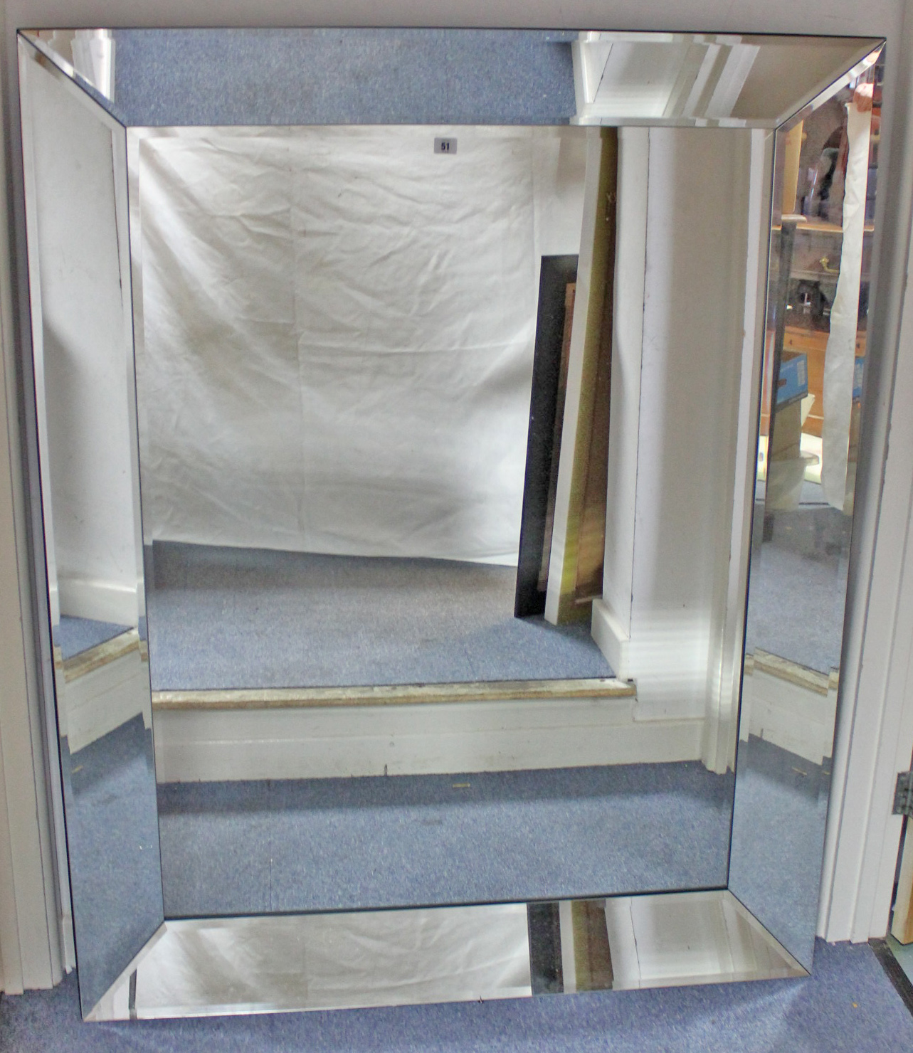 An R.V. Astley large rectangular bevelled wall mirror, 45¼” x 58”.