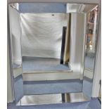 An R.V. Astley large rectangular bevelled wall mirror, 45¼” x 58”.