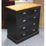 A natural & black painted pine chest fitted two short & three long drawers with brass cup handles, &