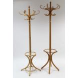 Two modern bentwood hat & coat stands.