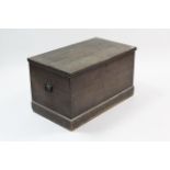 A 19th century grained deal travelling trunk with hinged lift-lid, wrought iron side handles & on