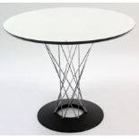 A JOHN LEWIS ISAMU NOGUCHI DINING TABLE with chrome-finish centre column, on cast-iron circular