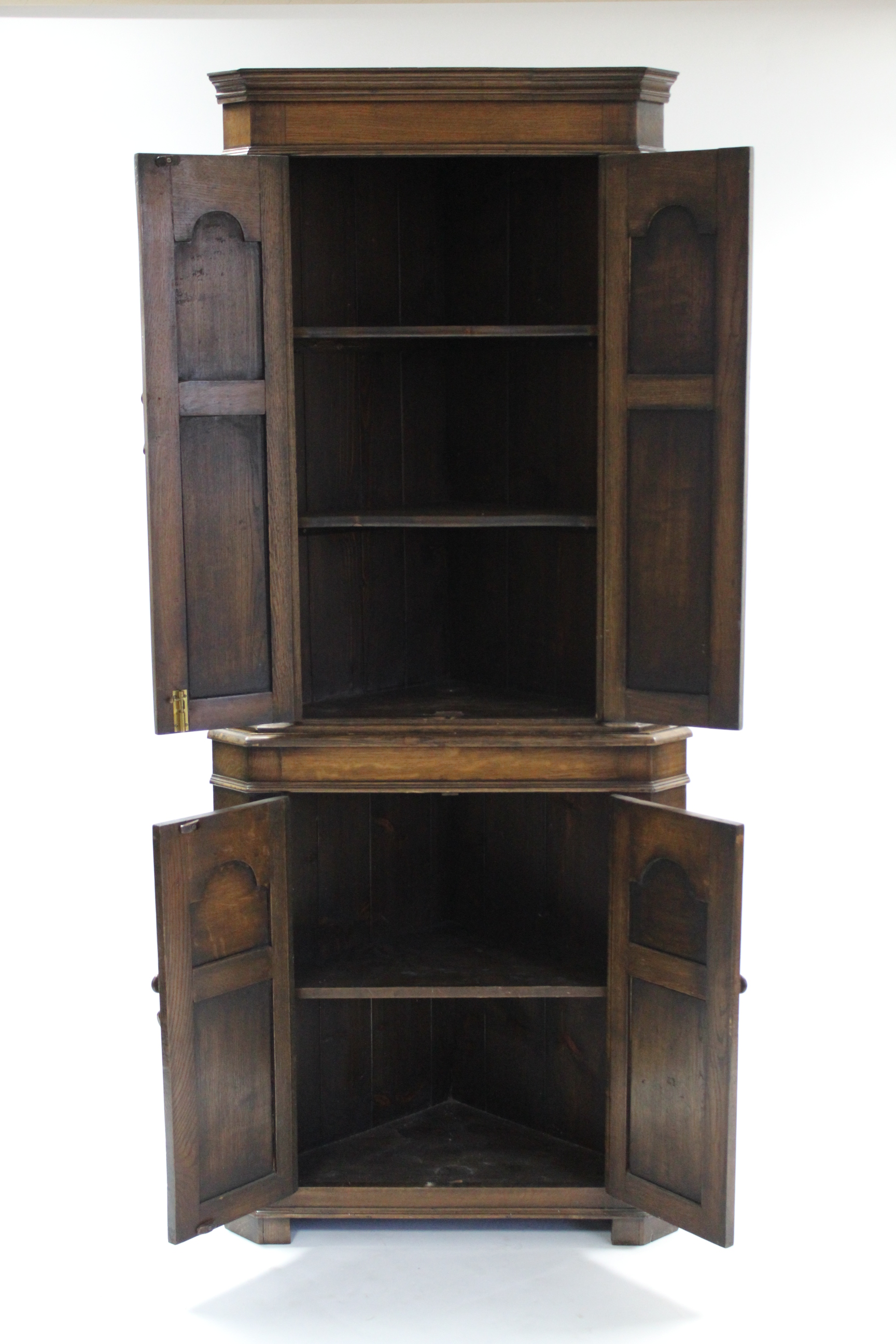 A reproduction oak tall standing corner cupboard, the upper part fitted two shaped shelves - Image 2 of 2