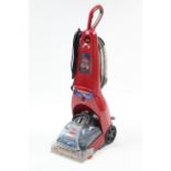 A Bissell “Proheat Plus 2X” upright carpet cleaner, w.o.