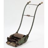A Vintage Anglia “Mark V” lawnmower (lacking grass box).