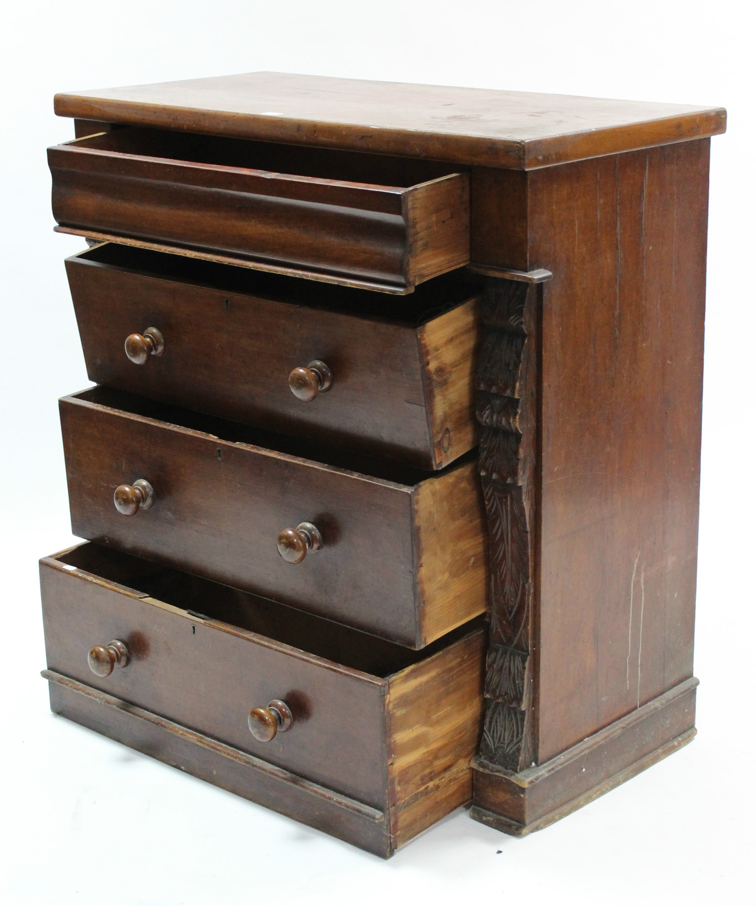 A Victorian mahogany chest fitted four long graduated drawers with turned knob handles & with carved - Image 2 of 3