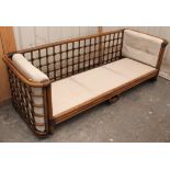 A Rattan three-seater conservatory settee, 80” long; a ditto pair of armchairs; & a ditto coffee
