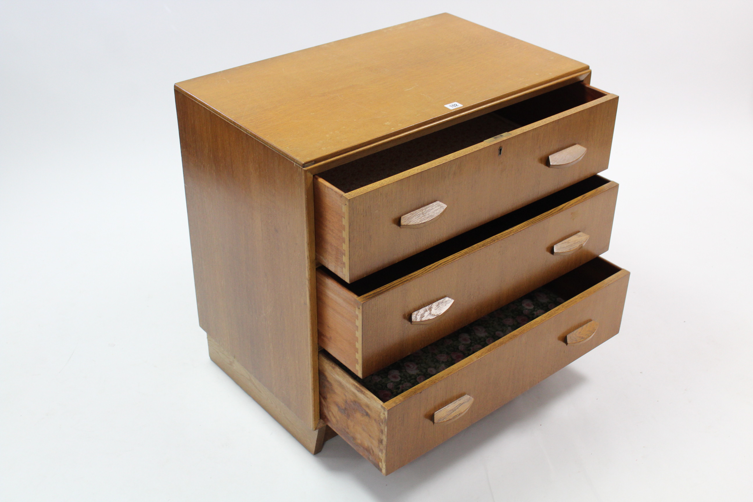 A Hunts light oak small chest, fitted three long drawers with block handles, & on plinth base, 30” - Image 2 of 3