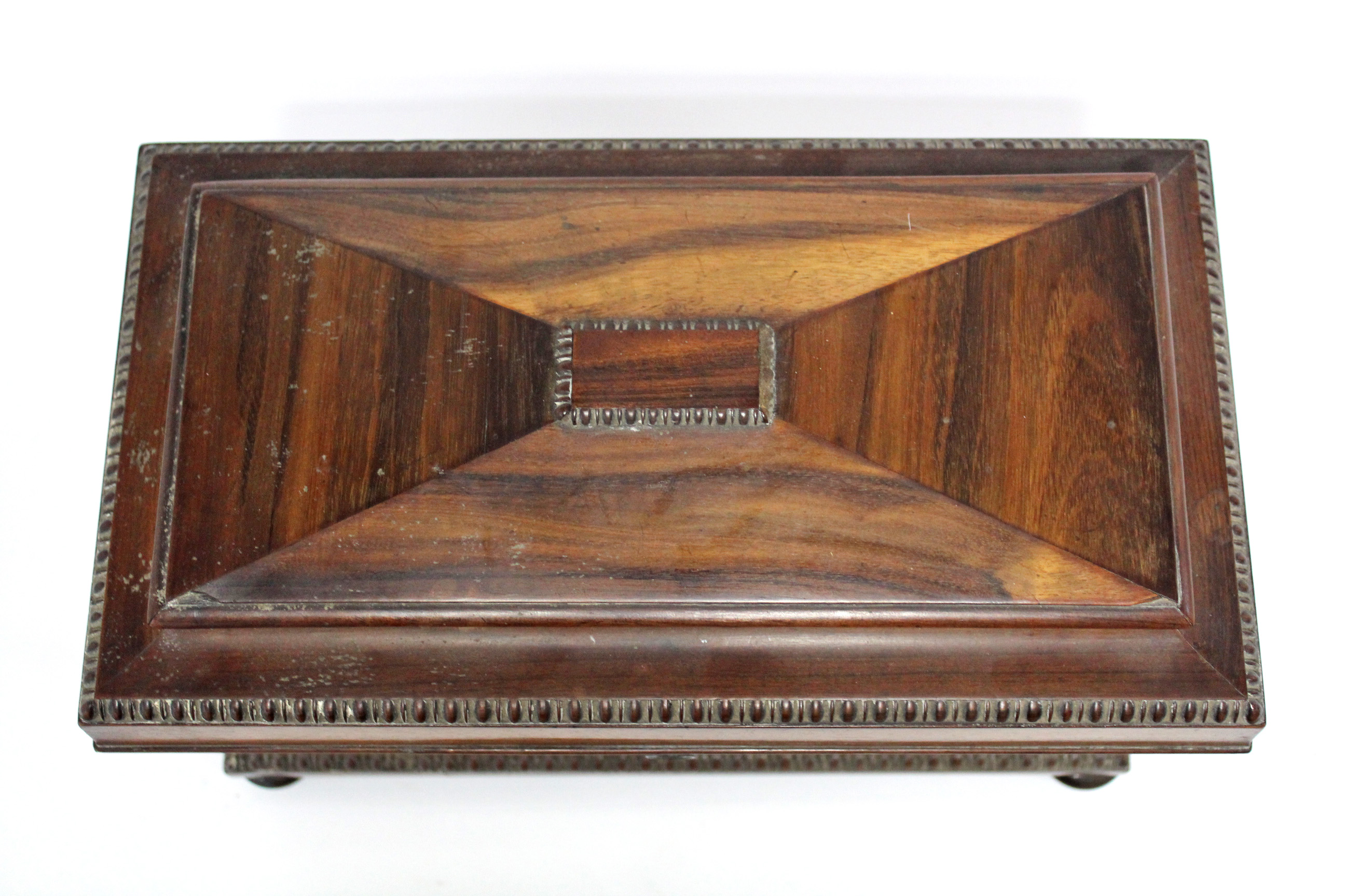 A regency Goncalo Alves tea caddy of rectangular tapered form with egg-&-dart decoration & fitted - Image 6 of 6