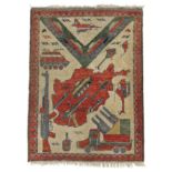 An Afghan Soviet-era war rug of ivory & crimson ground, with central depiction of the country