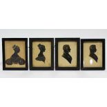 A group of four 19th century male & female silhouette portraits with gold highlights; each 8” x 4”.