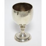 A modern silver goblet with ovoid bowl on pedestal foot, London 1959 by H. Phillips, 4½” high. (4 oz