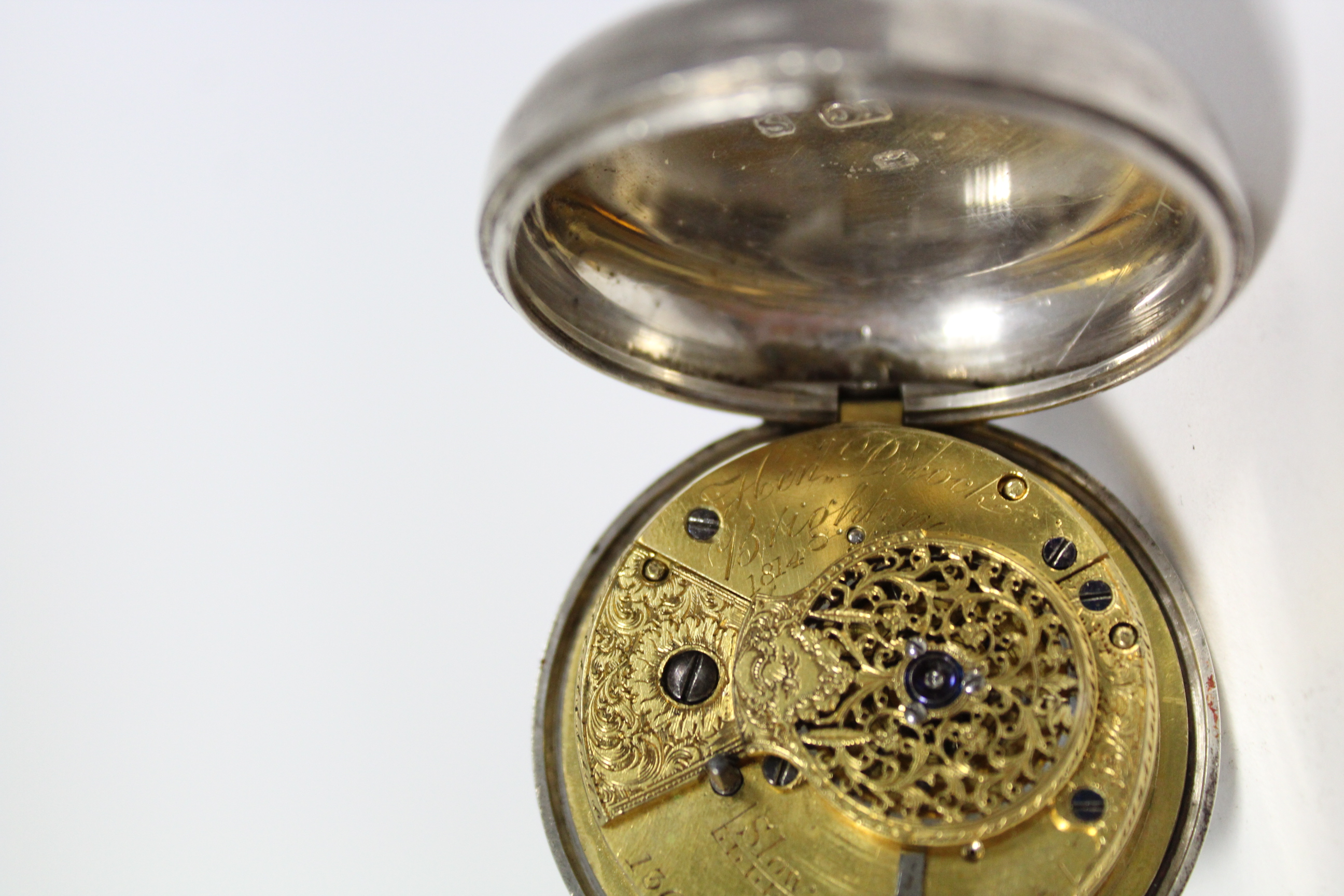 A George III silver pair-cased pocket watch with black roman numerals to the white enamel convex - Image 9 of 11