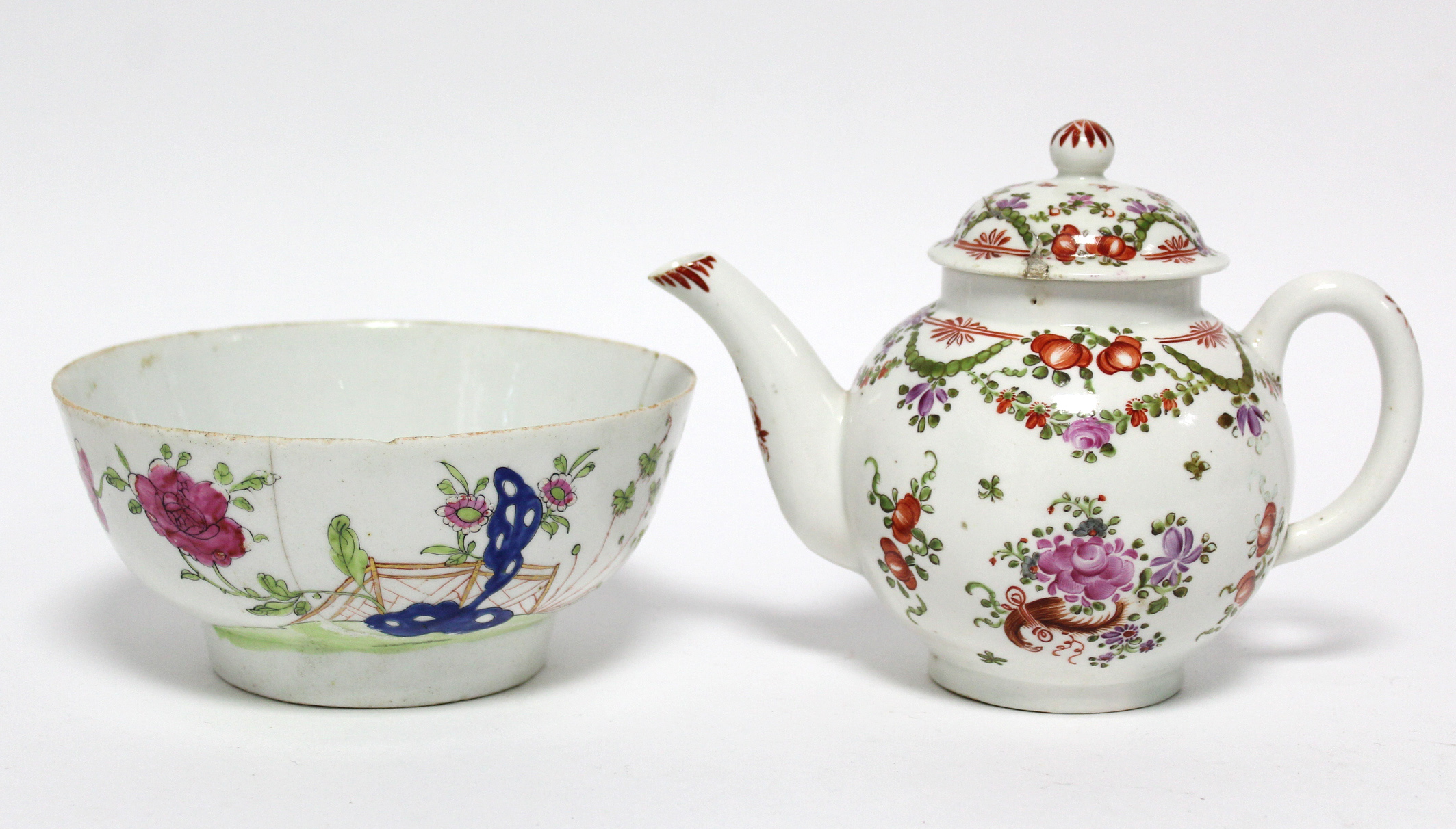 A Lowestoft porcelain round teapot with polychrome painted flowers & green foliate swags, 5½”