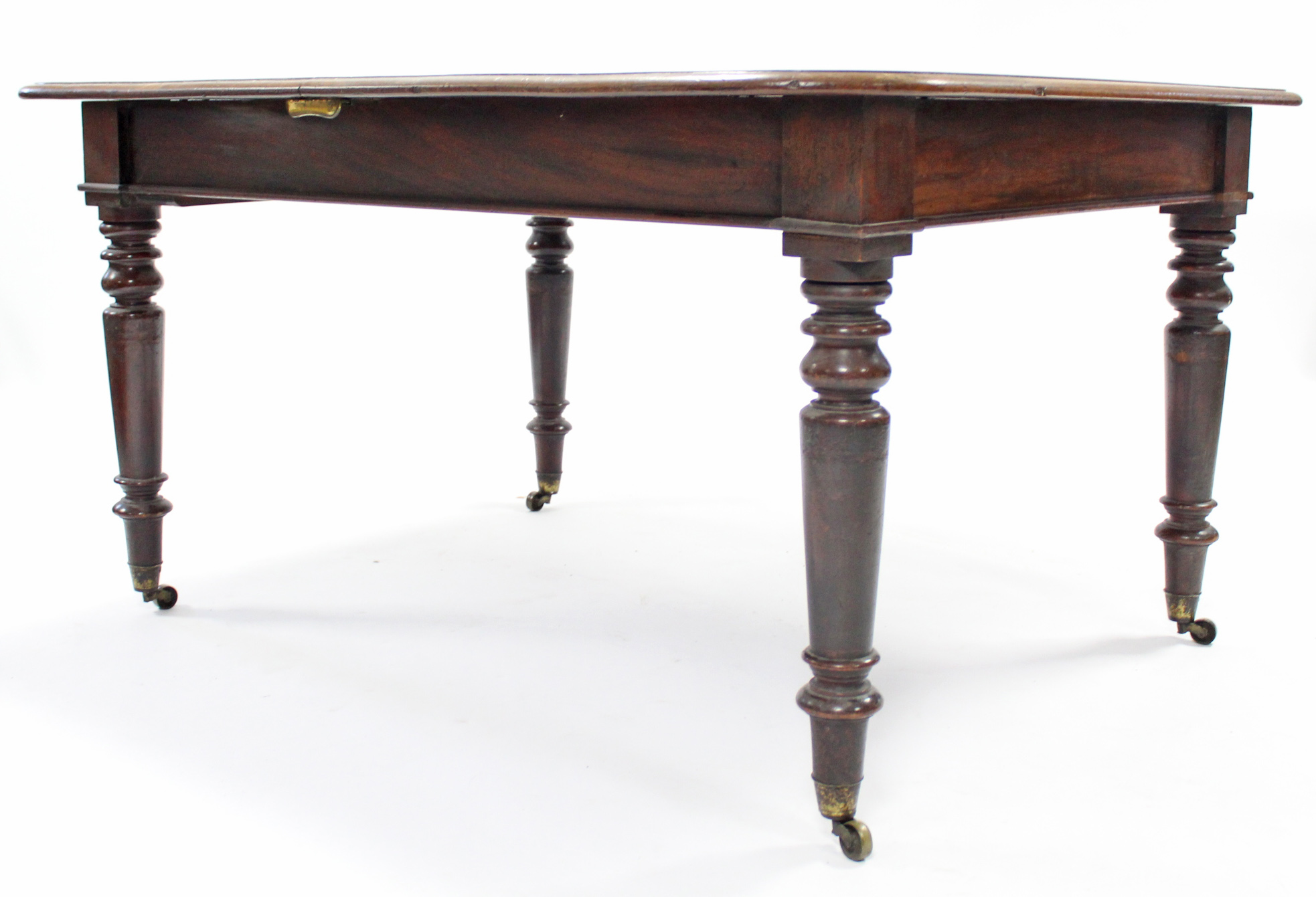 A Victorian mahogany extending dining table with rounded corners & moulded edge, on ring-turned - Image 2 of 3