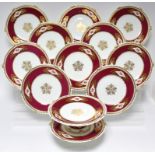 A Victorian dessert service with beaded rims, reserves of pink roses to the wide ruby & gilt