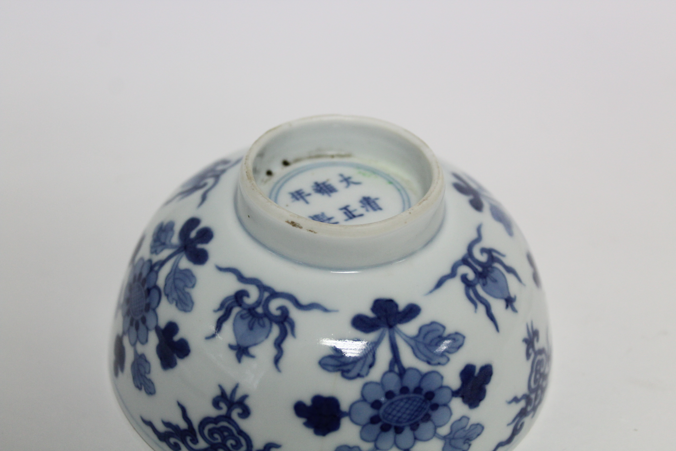 A Chinese blue & white porcelain deep bowl with lotus rim, painted with panels of deer amongst - Image 15 of 24