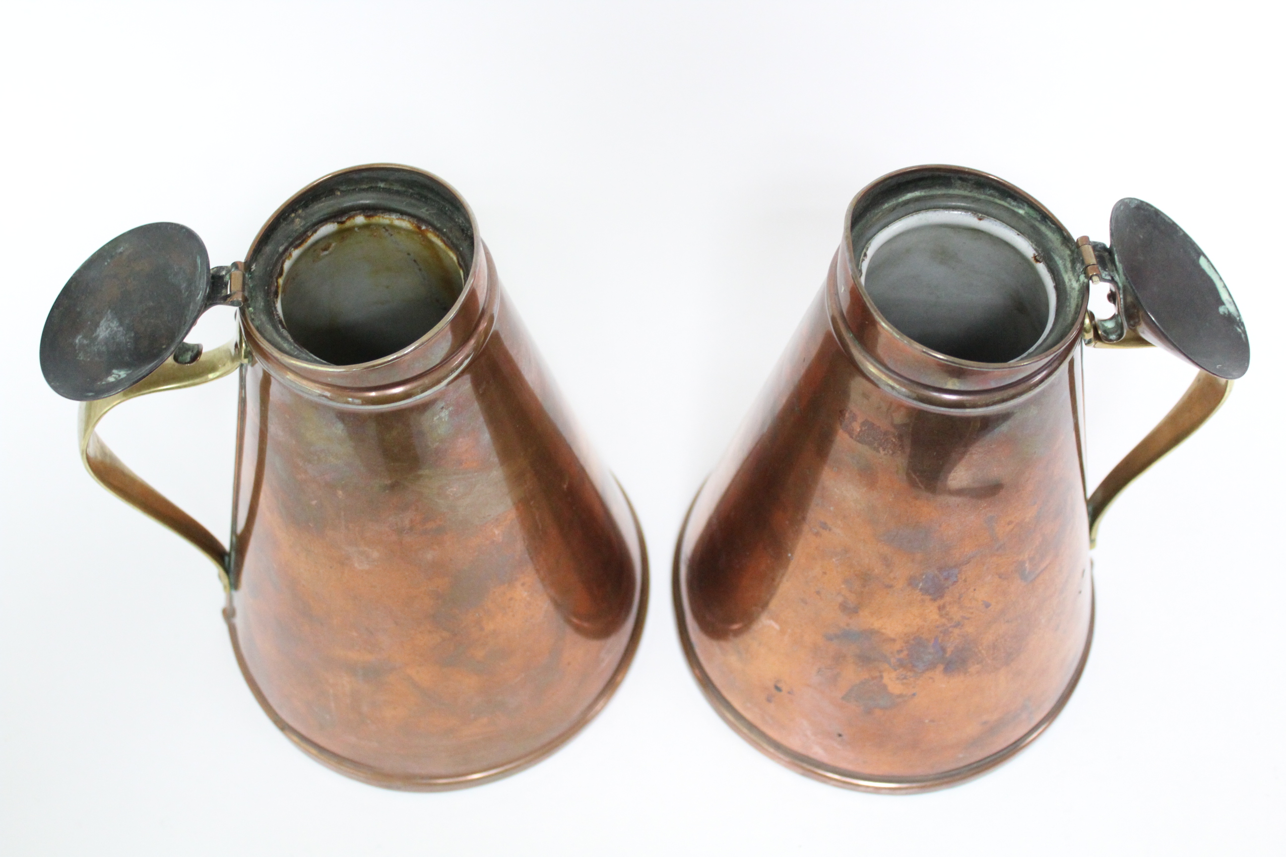 A pair of W. A. S. Benson Arts & Crafts copper “Jacketed Jugs” of tapered cylindrical form, with - Image 3 of 8
