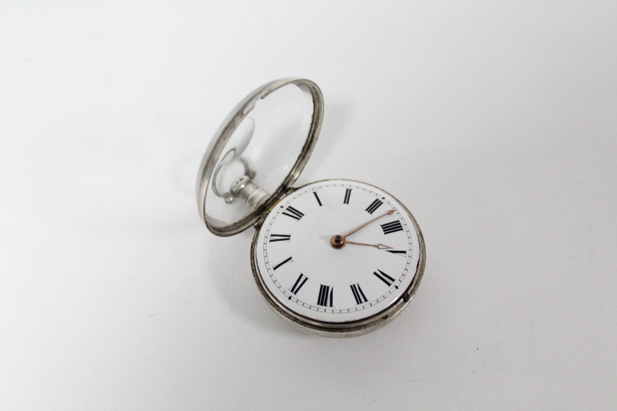 A George III silver pair-cased pocket watch with black roman numerals to the white enamel convex - Image 6 of 11